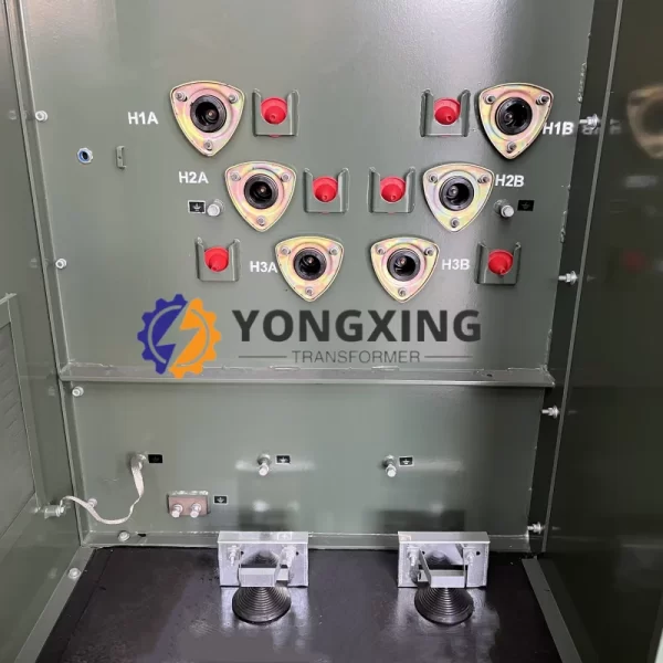 Precision-engineered high and low voltage connections of Yongxing Transformer’s 500 kVA 3-phase pad-mounted transformer.