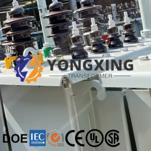 High and low voltage bushings for 13.8 kV to 0.4 kV 3000 kVA substation transformer by Yongxing Transformer.